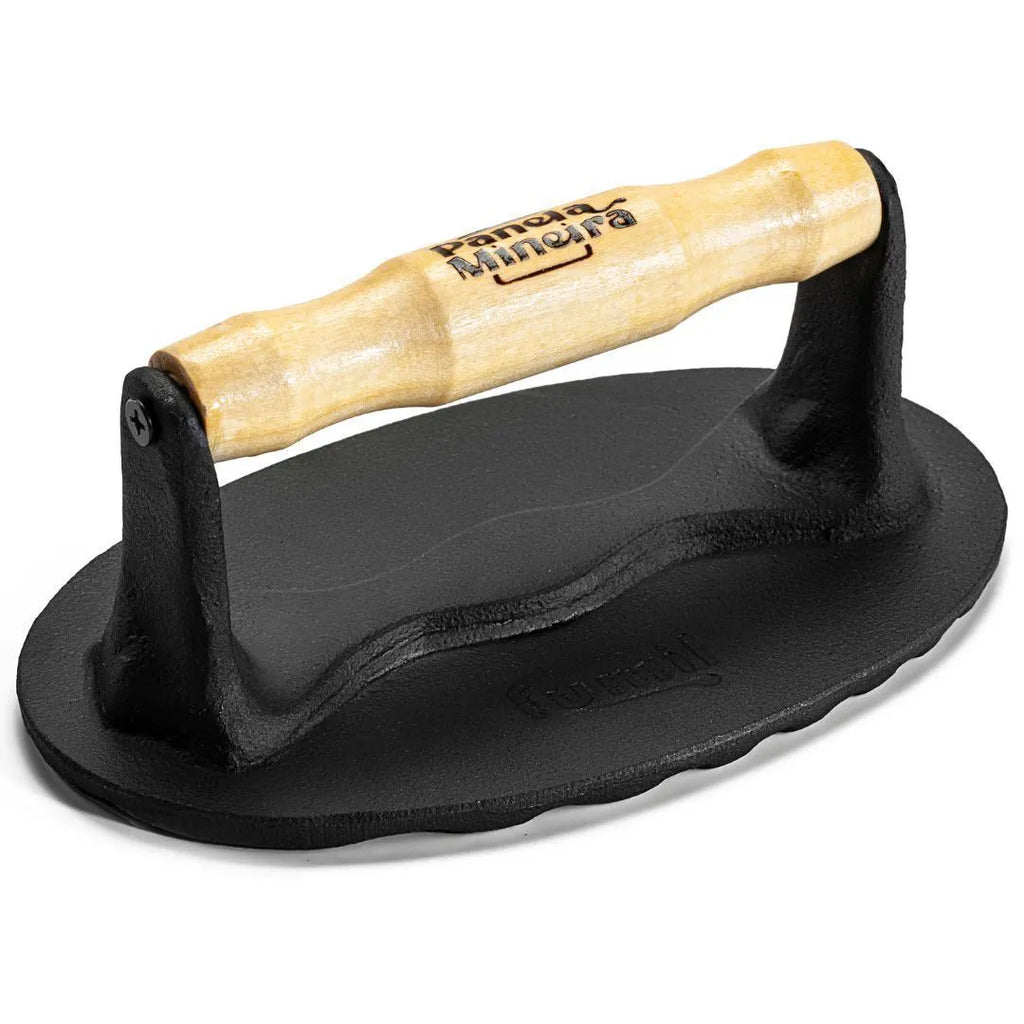 Prensador de hierro fundido con mango de madera